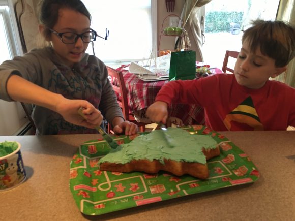 Bake and decorate a Christmas tree cake to celebrate Christmas in July in New Jersey.