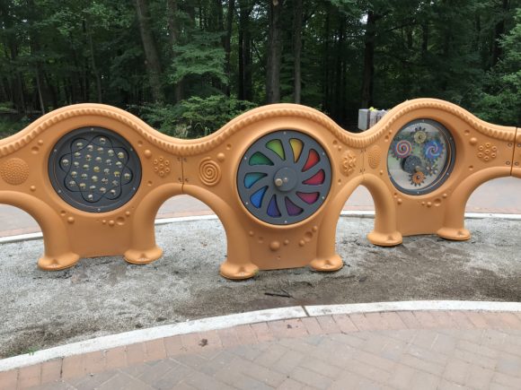 There are two spinning wheels and dials and one spinning ball area as part of the Union County sensory Trail