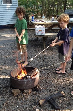 Roasting marshmallows at Baker's Acres.