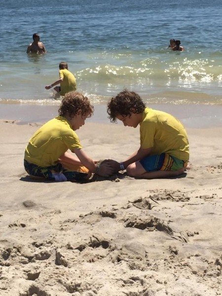 Boys playing on a New Jersey beach