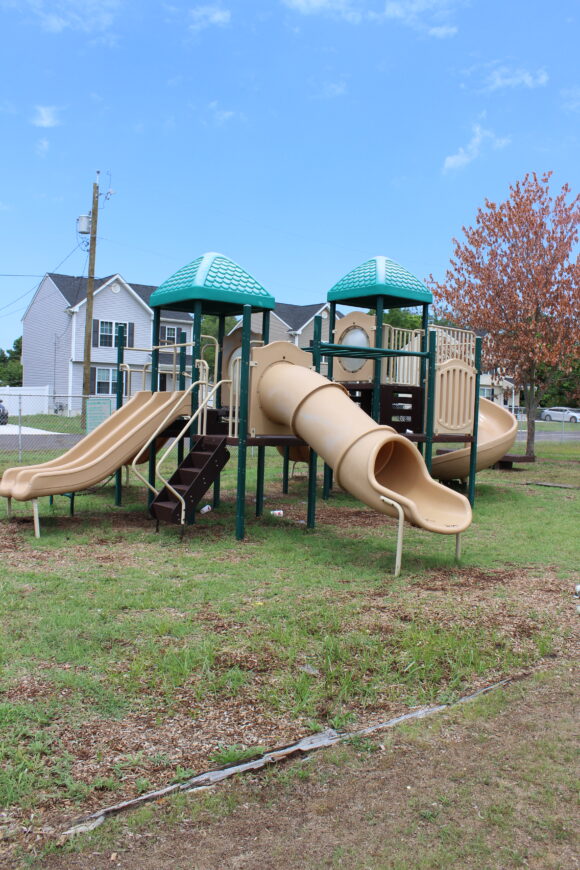 Friendship Park Playground in Millville NJ - TALL image - playground structure tunnel slide side