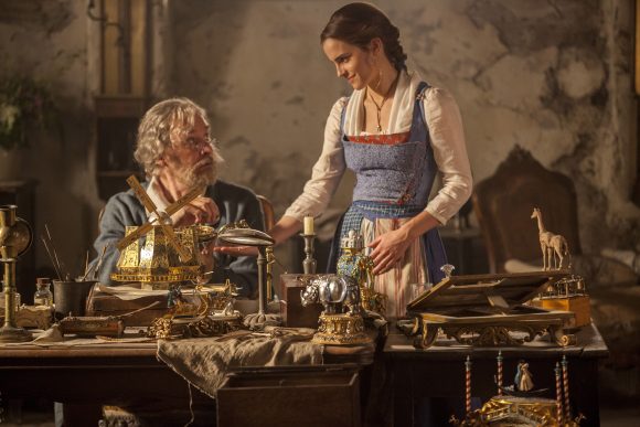 Belle's dad, Maurice is tinkering with a music box.