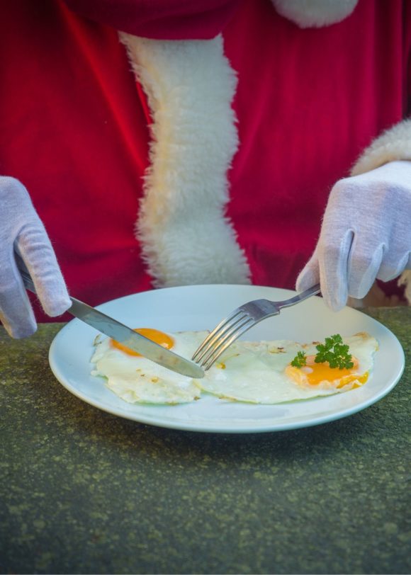 Santa eating breakfast at Breakfast with Santa event in New Jersey
