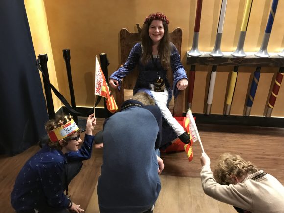 Boys kneeling to Jenn at Medieval Times in New Jersey photo credit Jersey Family Fun