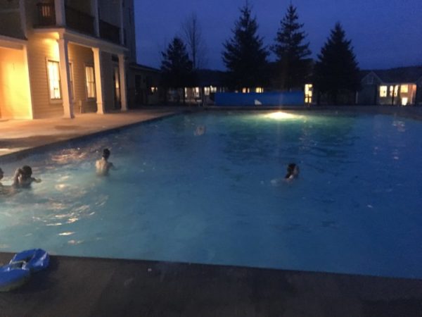 Night swimming outside at Okemo Mountain Resort