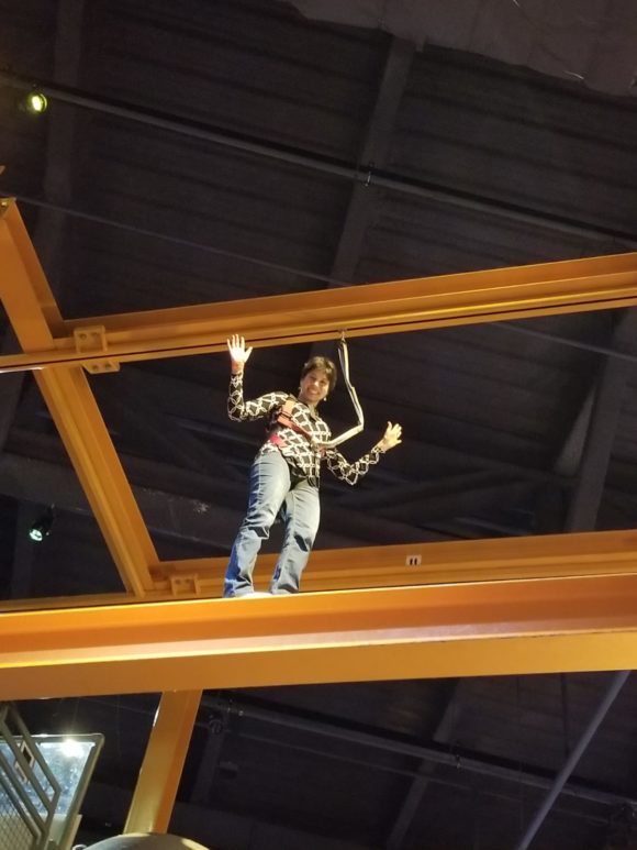 Walk across a high steel beam at the Liberty Science Center in Jersey City New Jersey