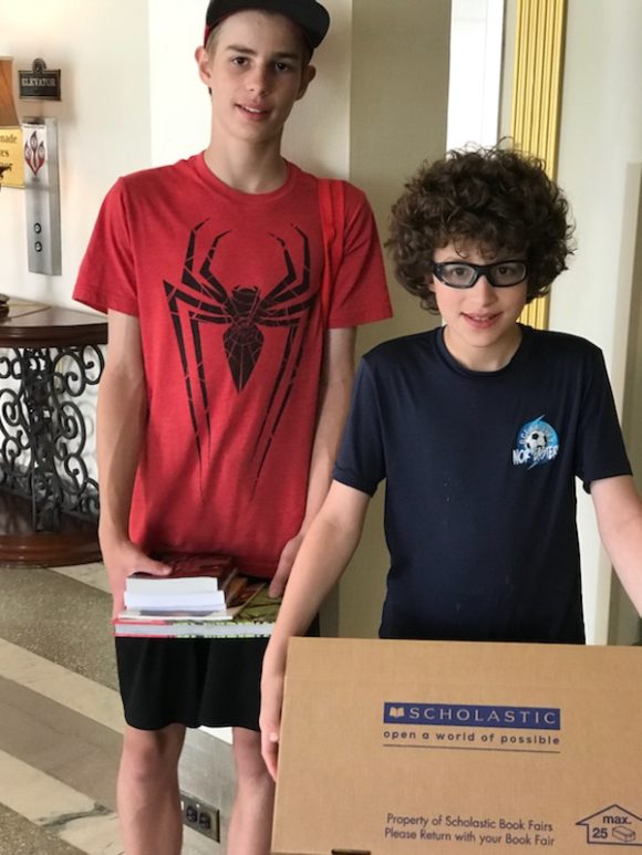 Scholastic Book Fairs warehouse boys with books in Ocean City