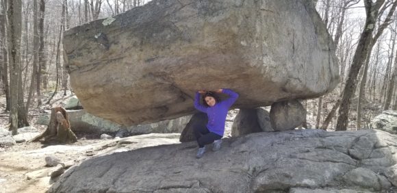 girl with rock structure at Pyramid Mountain National Historic Area in Boonton nj