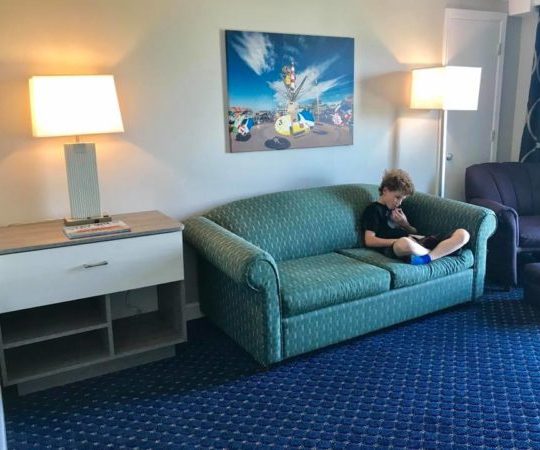 The Adventurer Oceanfront Inn family suite offers 2 spacious rooms. One has a sleepaway couch.