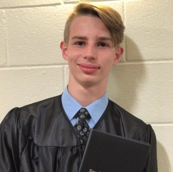 middle school student graduating from 8th grade