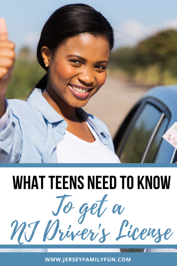 Black female teenager gives the thumbs up after getting her driver's license in New Jersey.