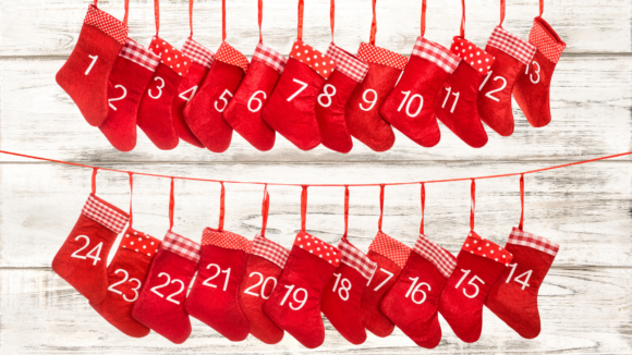 Two rows of stockings serve as an advent calendar for teenagers.