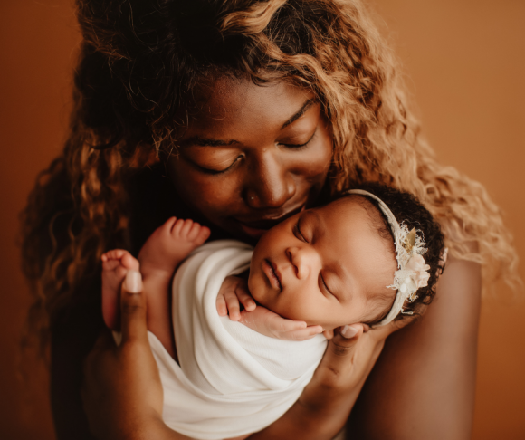 beautiful black mother with newborn