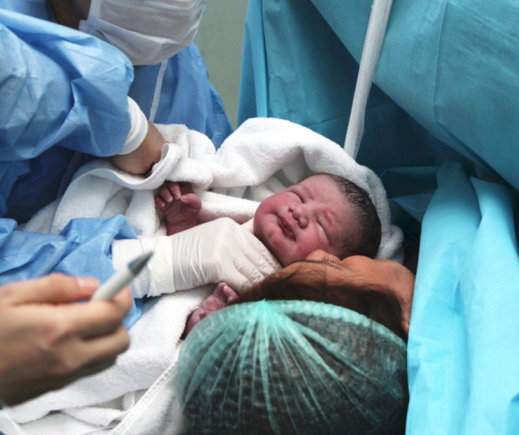 Newborn and Mother in hospital during childbirth. Some changes after pregnancy will set in immediately and others will take place over months.