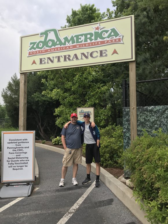 Father and son at ZooAmerica entrance