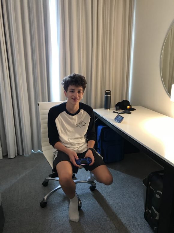 teen boy at desk in hotel room at Loews Hotel Philadelphia