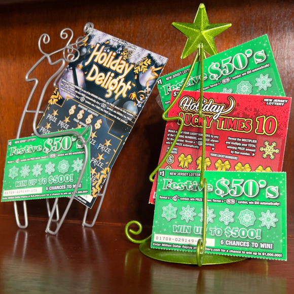 New Jersey lottery tickets paired with a Christmas tree or reindeer make great teachers gifts.