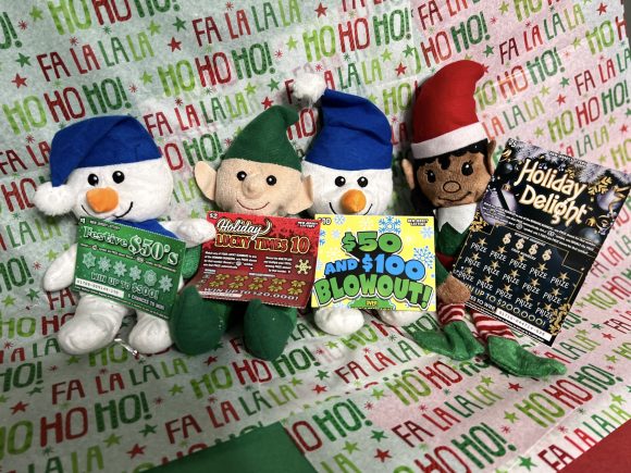 plush snowman and elves paired with New Jersey instant lottery tickets make great gift ideas for teachers