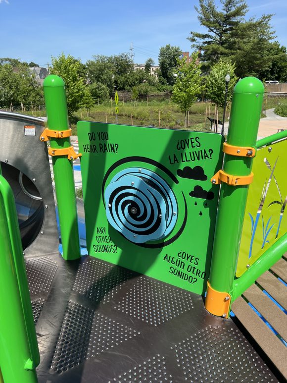 Bilingual sensory play areas on the playground equipment at Dundee Island Park in Passaic NJ