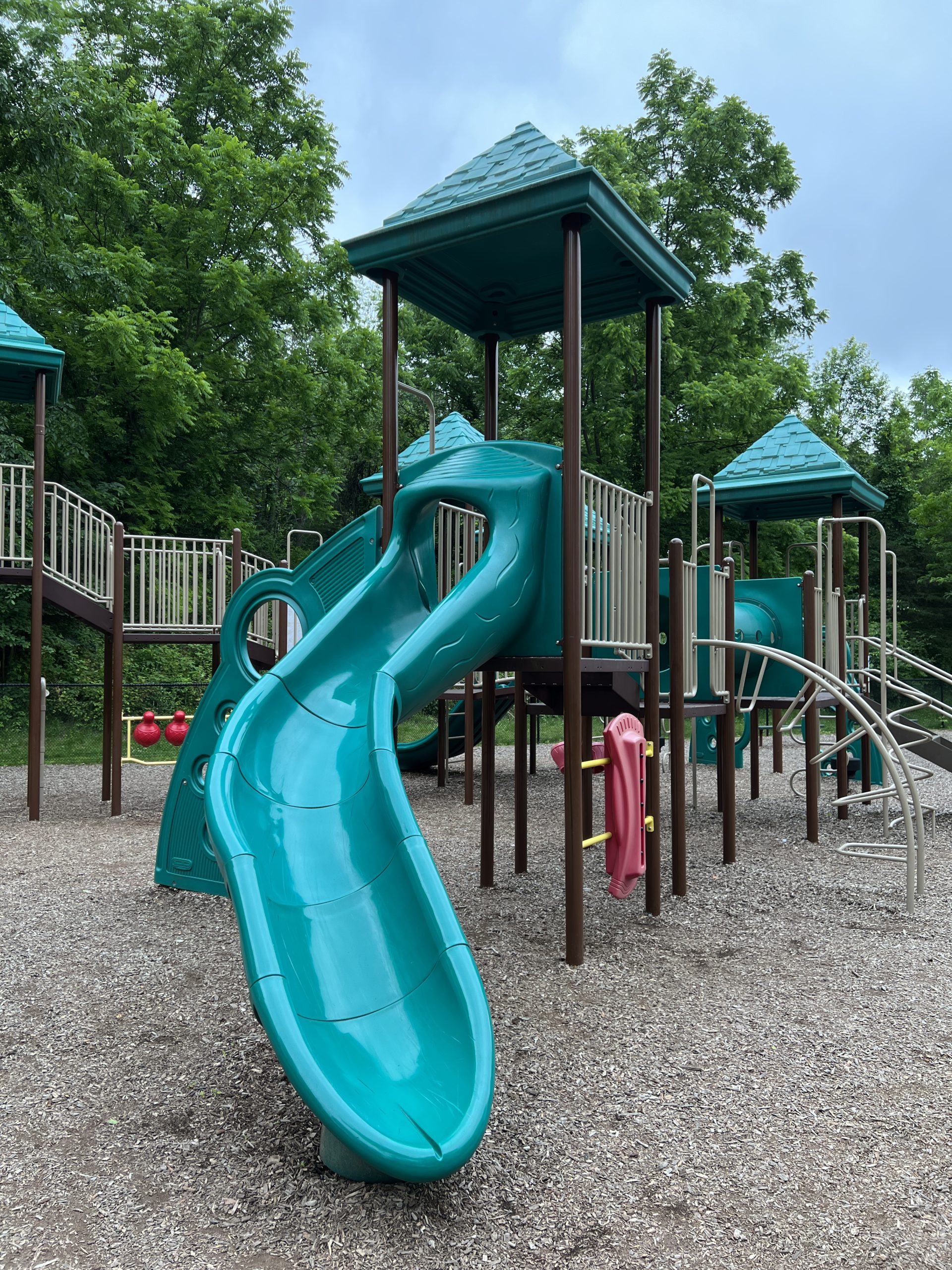 First Curvy Slide for older kids at Kids Kastle Station Park Playground in Sparta NJ