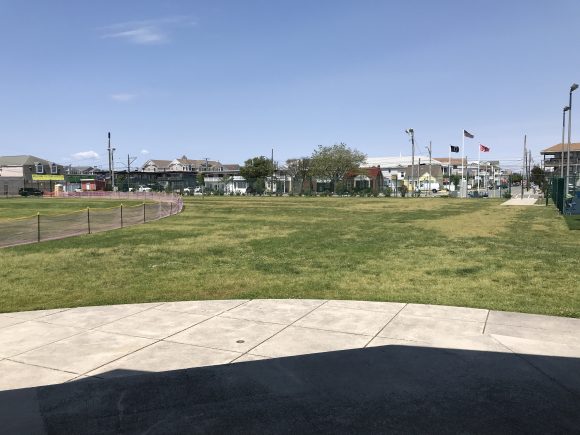 Front grassy lawn at Fox Park Playground in Wildwood NJ ampitheater where summer concerts are held.