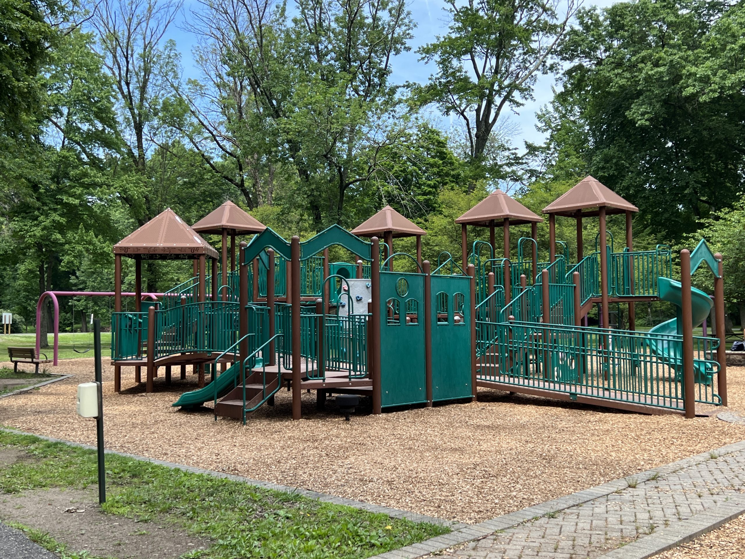 Horizontal picture of older kid playground at Saddle River County Park Playground in Ridgewood NJ accessible ramp 2