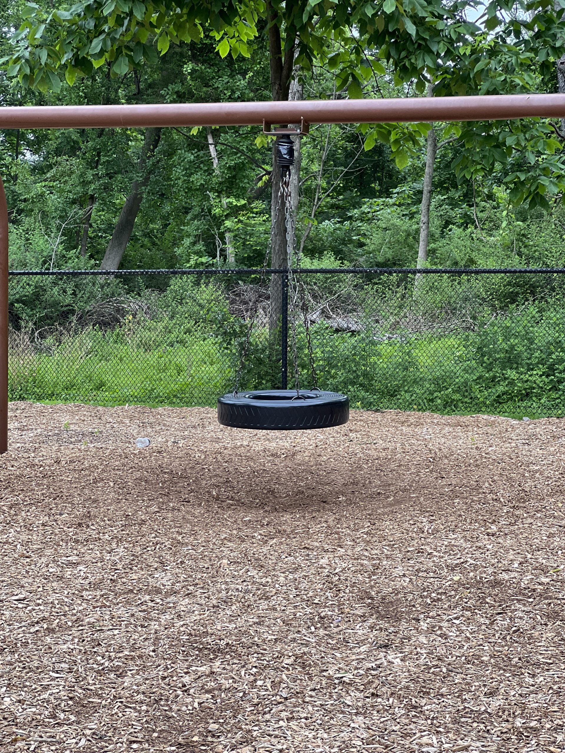 Tire swing at Kids Kastle Station Park Playground in Sparta NJ