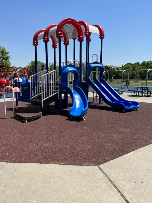 vertical picture of the toddler playground equipment at Fasola Park in Deptford New Jersey