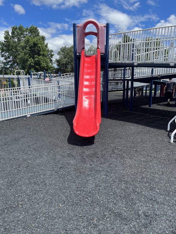 Red slide at Veteran's Memorial Park Playground in Gloucester Township New Jersey