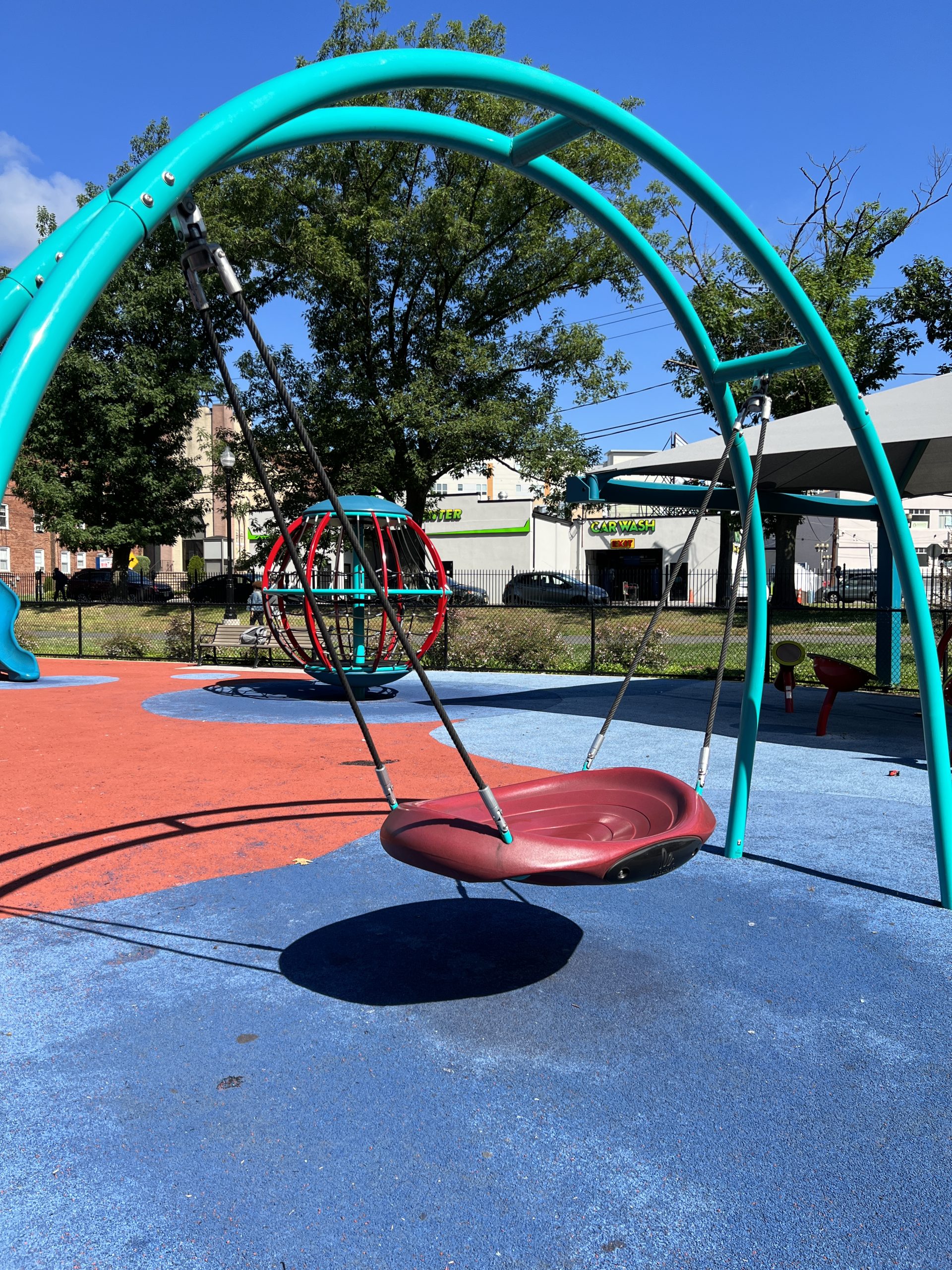 Watsessing Park Playground in Bloomfield NJ disc like swing