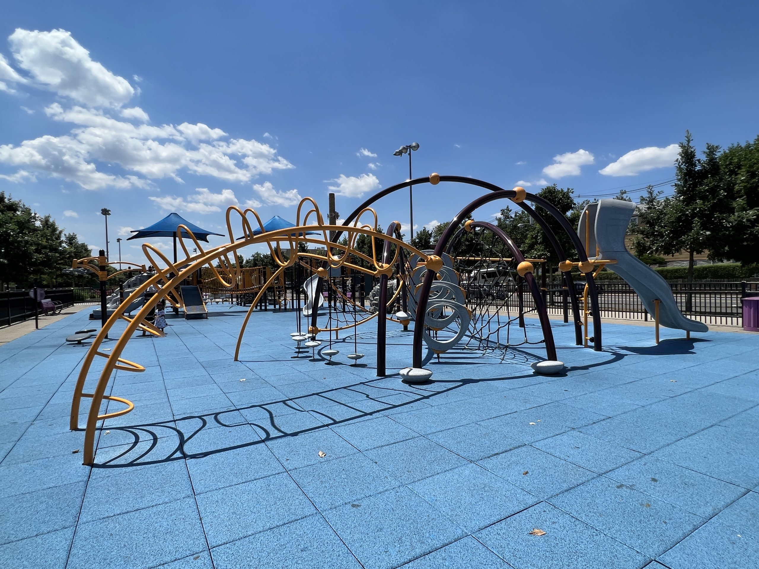 Berry Lane Park Playground in Jersey City NJ large twisting web and ladders with o ring climbers wide shot 1