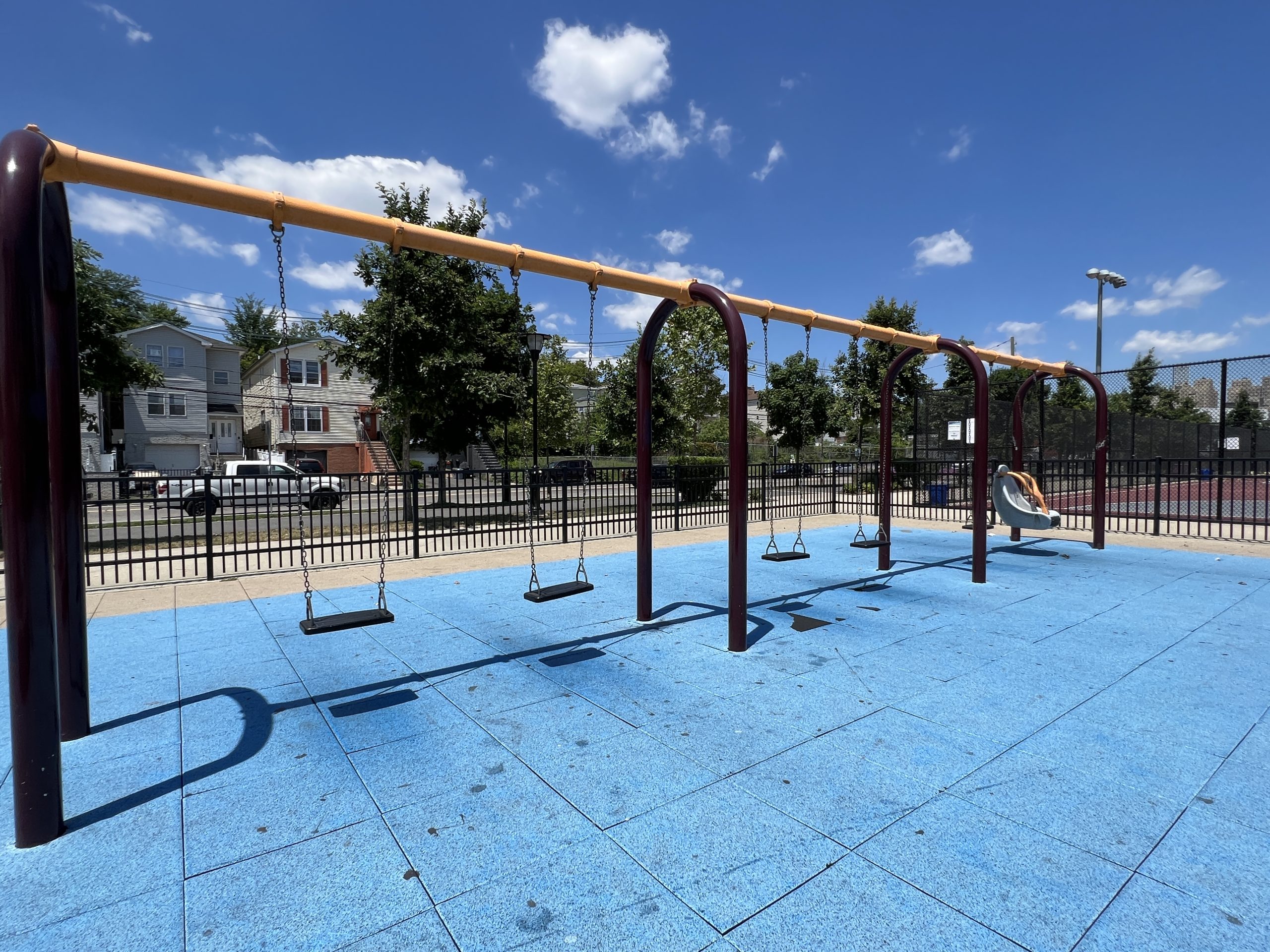 Berry Lane Park Playground in Jersey City NJ swings traditional