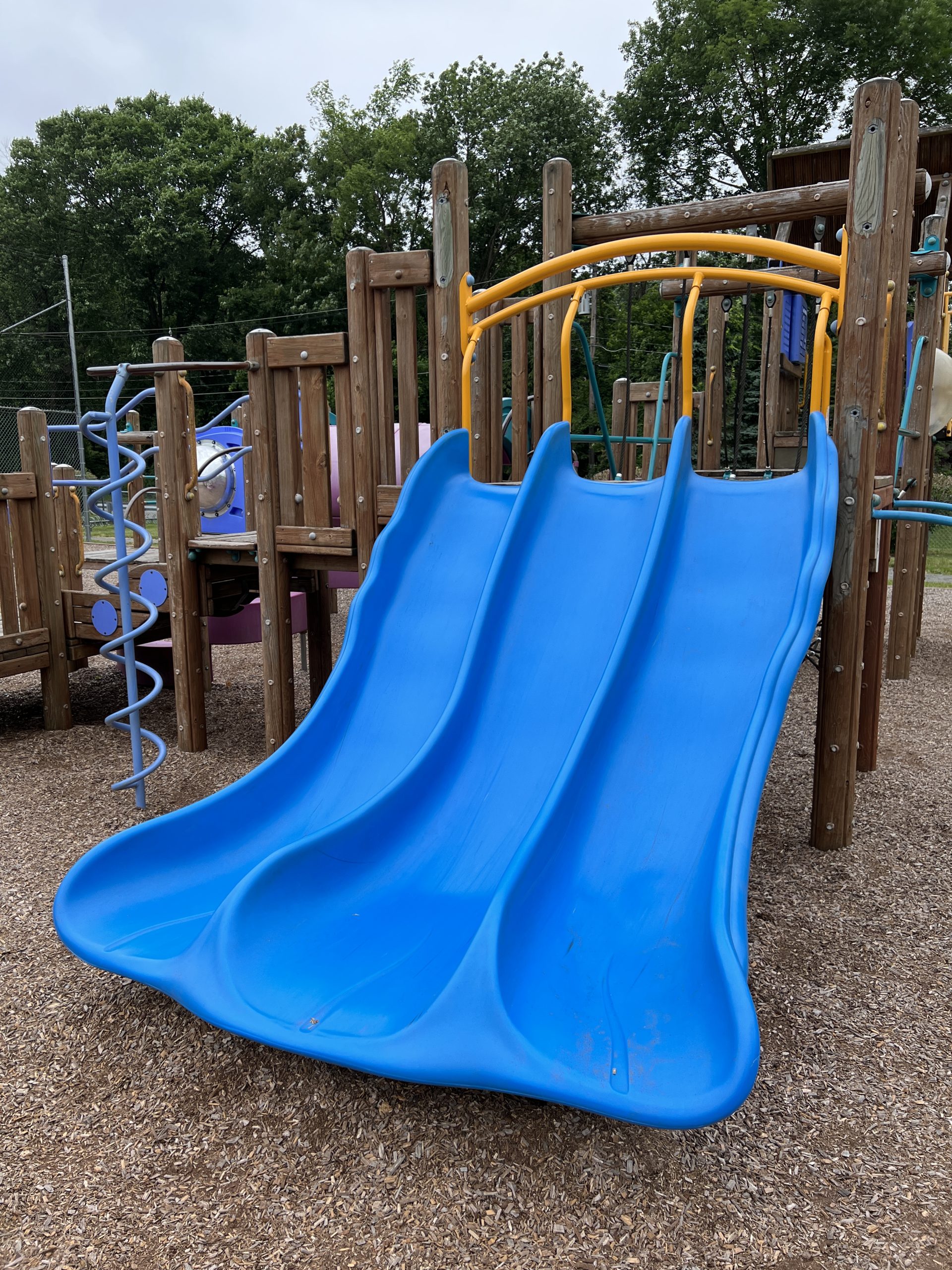 Blue side by side slides at C O Johnson Park Playground in Byram Township NJ