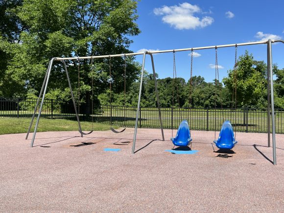 Challenger Place Park Playground in Colts Neck NJ traditional and molded bucket swings