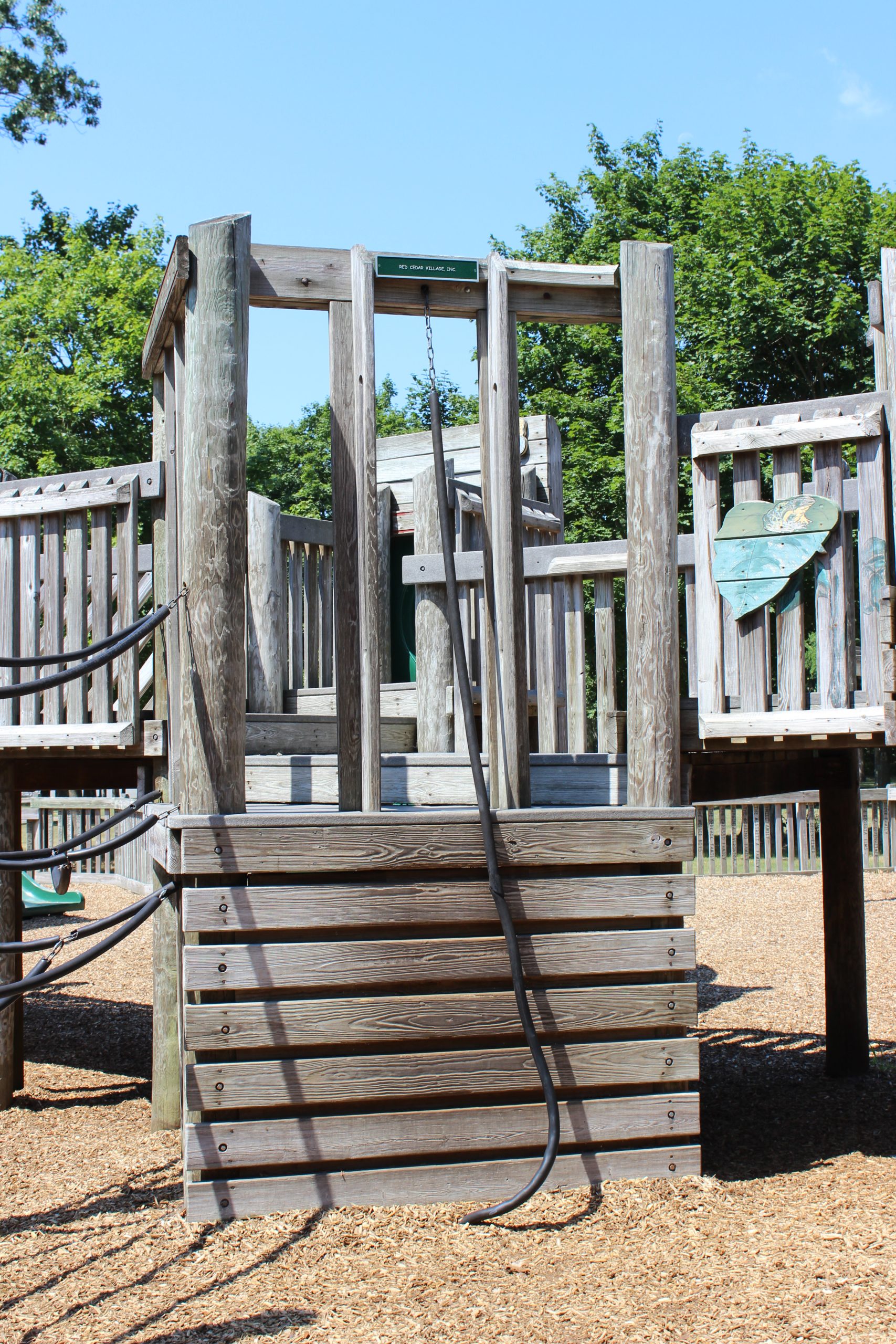 Climbing wall with rope at Jackson Jungle Play Park Playground in Jackson NJ