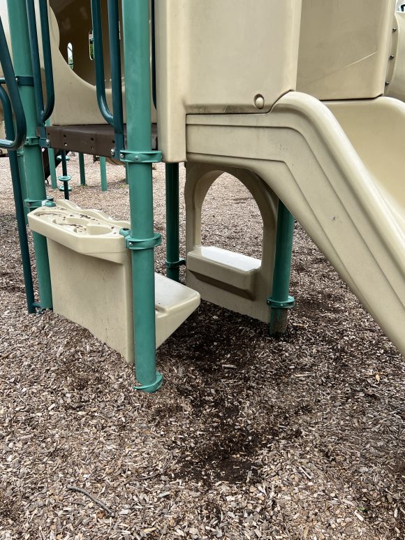 Franklin Lakes Borough Municipal Field Playground in Franklin Lakes NJ shady area under playground equipment