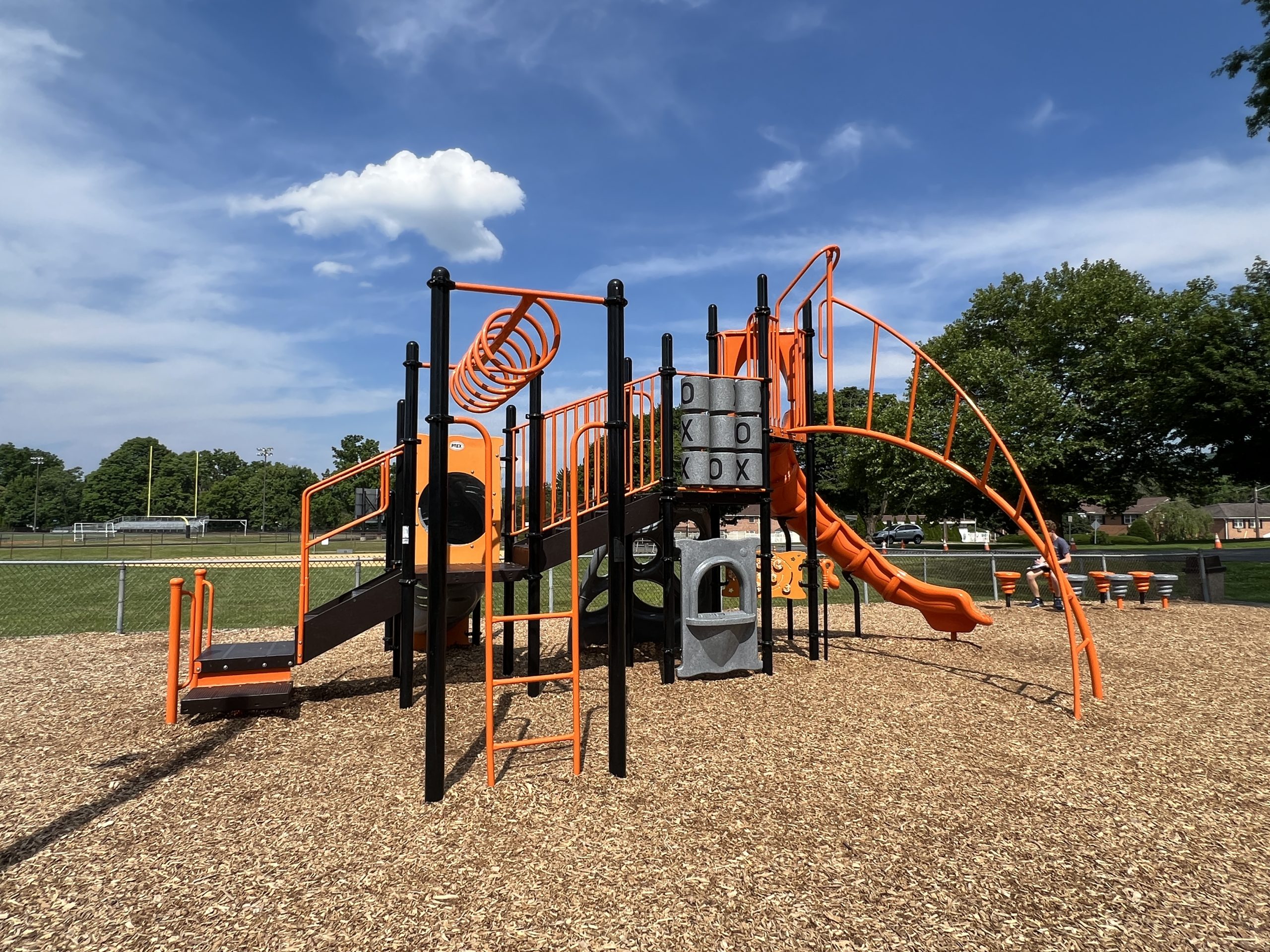 Hackettstown Community Park Playground in Hackettstown NJ horizontal picture of bigger structure with stepping pods in background