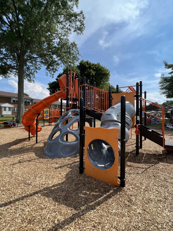 Hackettstown Community Park Playground in Hackettstown NJ vertical picture of bigger structure tunnel slide and holy climbing wall