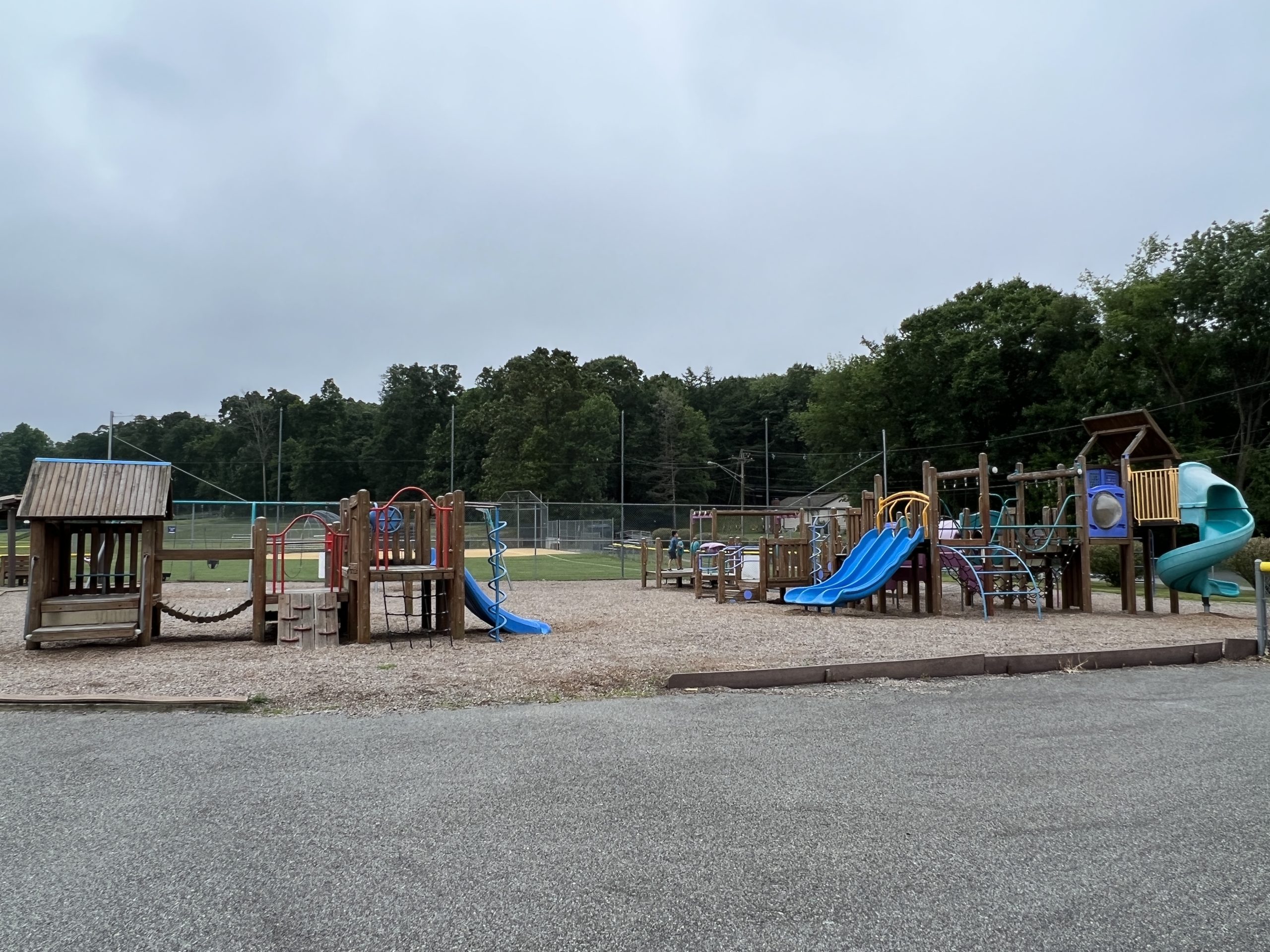 Horizontal picture of BOTH playgrounds at C O Johnson Park Playground in Byram Township NJ