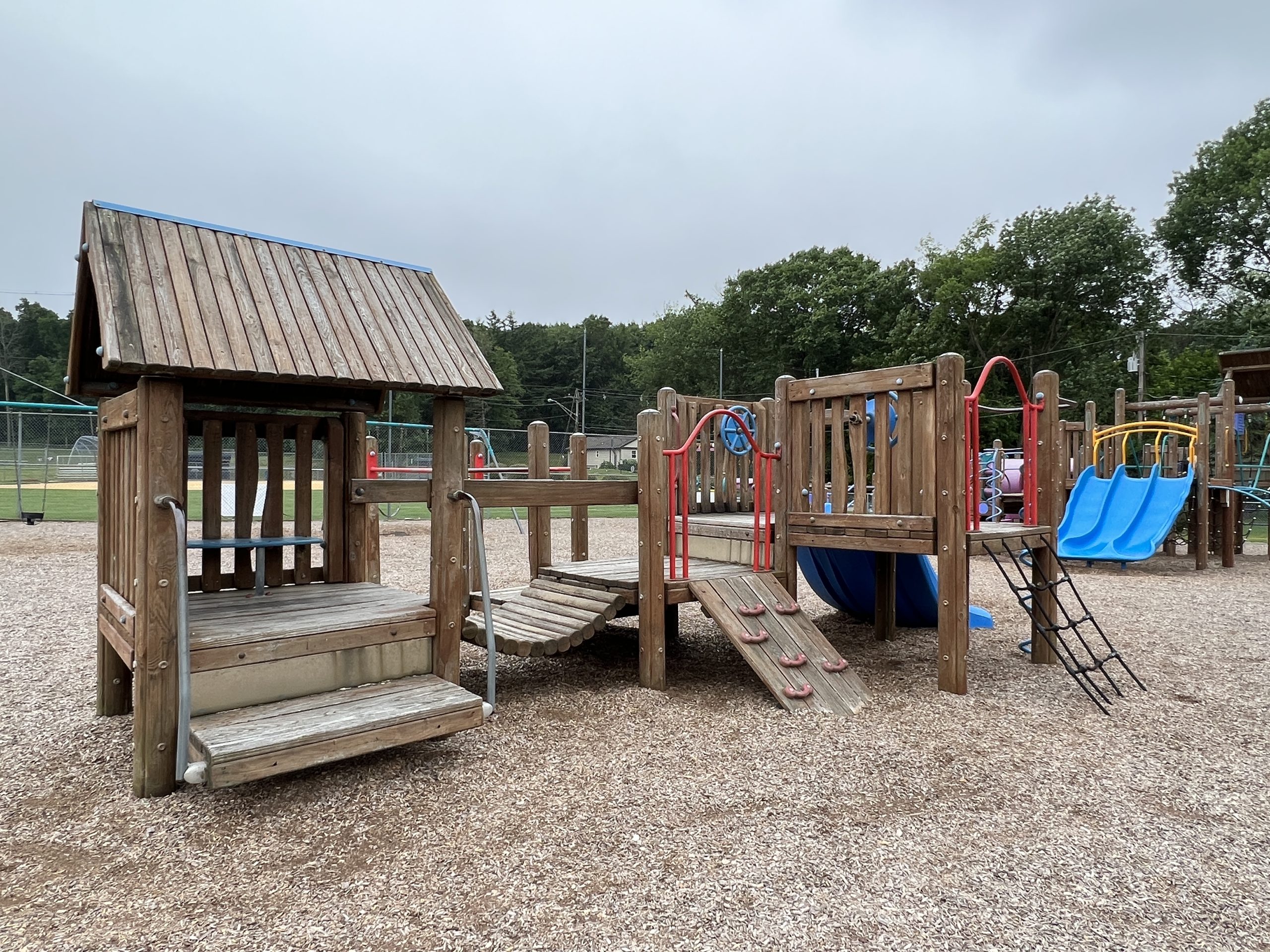 Horizontal picture of preschooler playground at C O Johnson Park Playground in Byram Township NJ best view of shady space