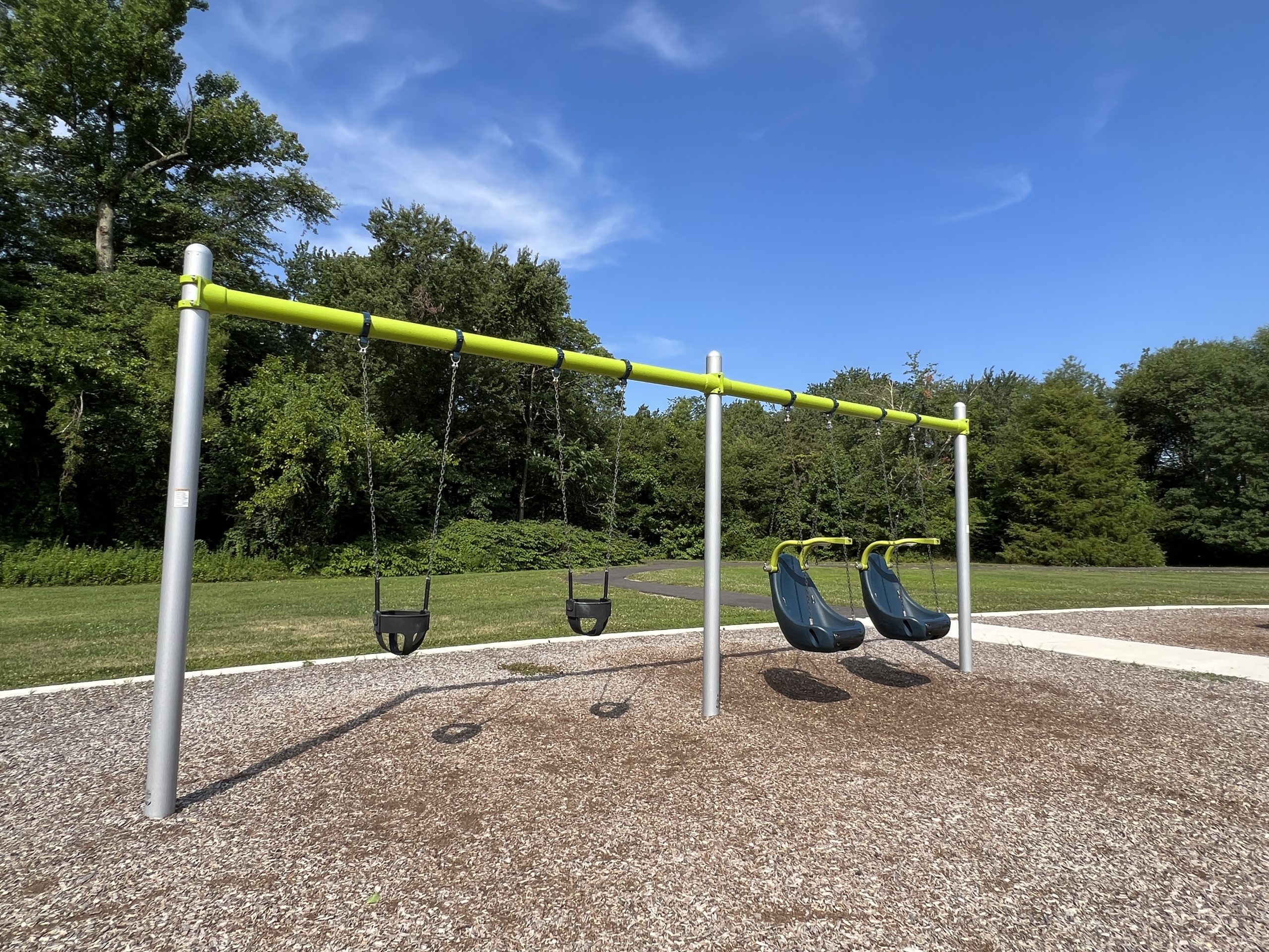 Larger Playground at Berlin Park Playgrounds in Berlin New Jersey swings horizontal