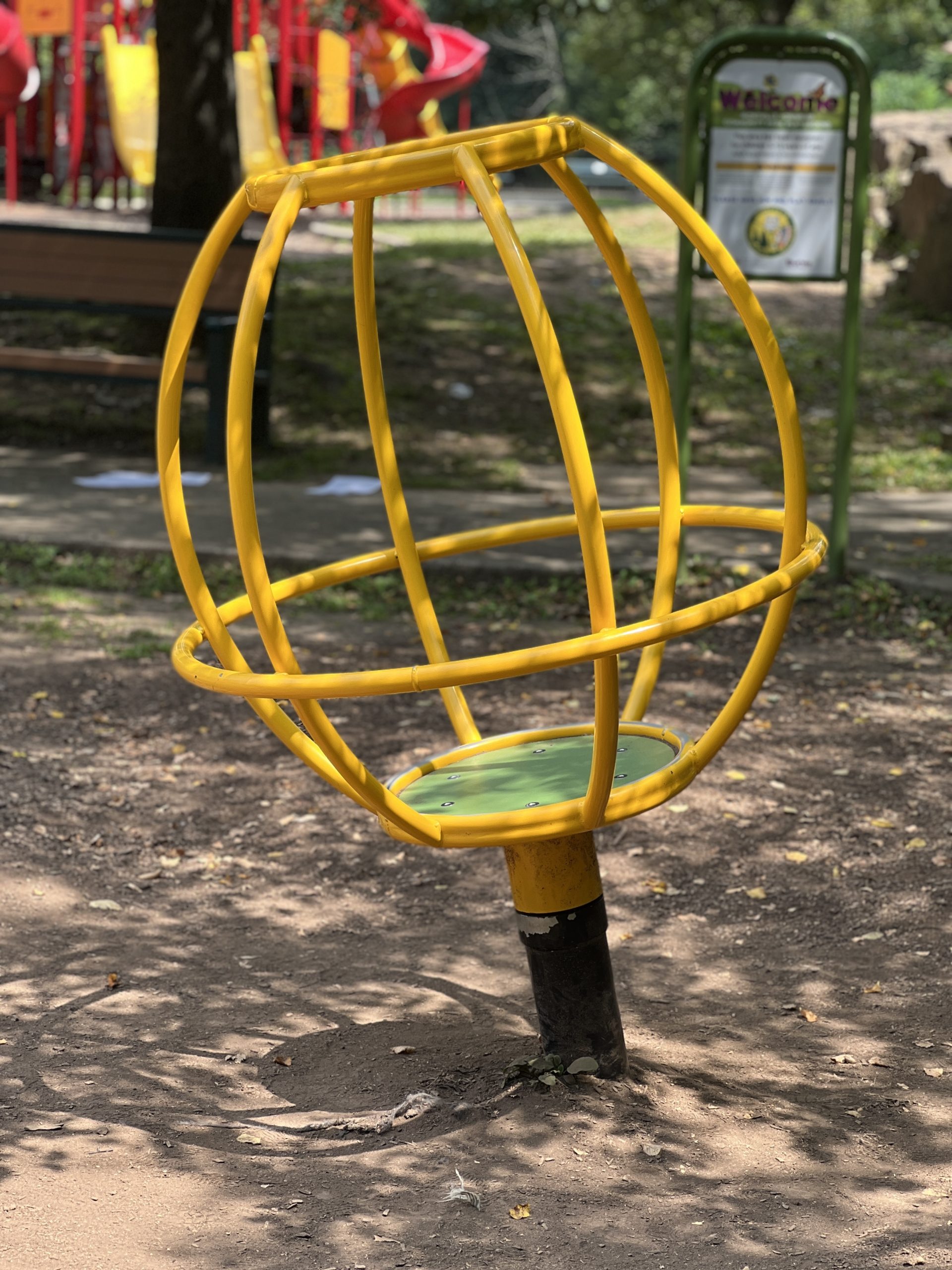 Montville Community Playground in Montville NJ mini yellow spinning globe