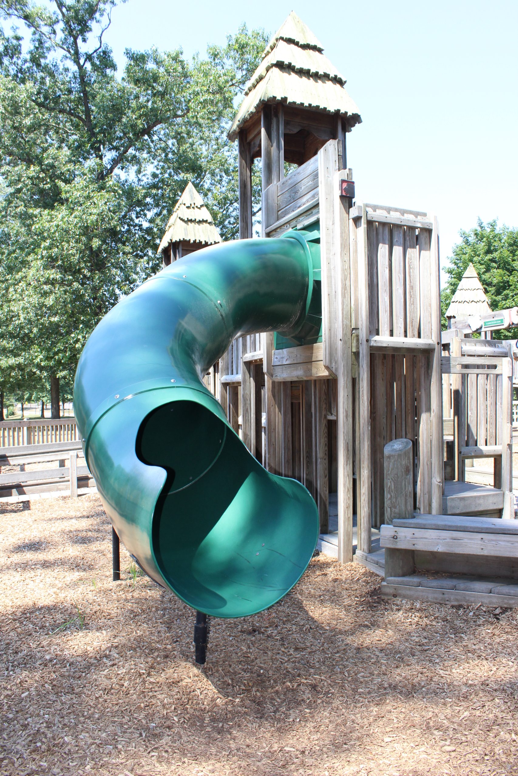 SLIDE - Green tunnel curvy slide at Jackson Jungle Play Park Playground in Jackson NJ