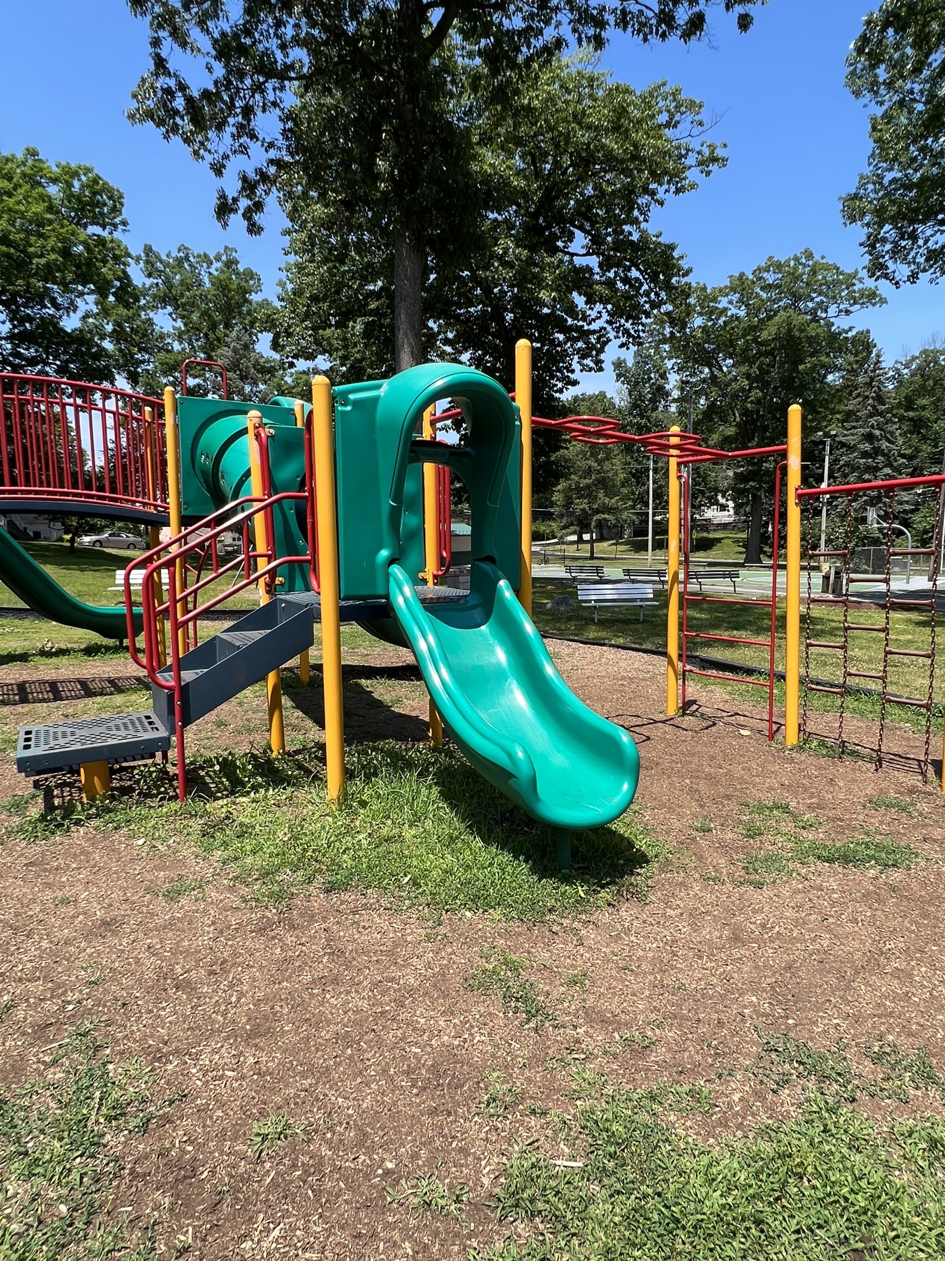 SLIDE short green straight and monkey bars at Modick Park Playground in Hopatcong NJ