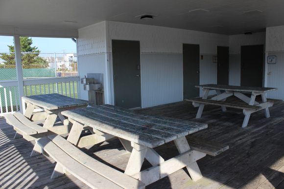 Sandcastle Park Playground in Ocean City NJ picnic tables at restroom building