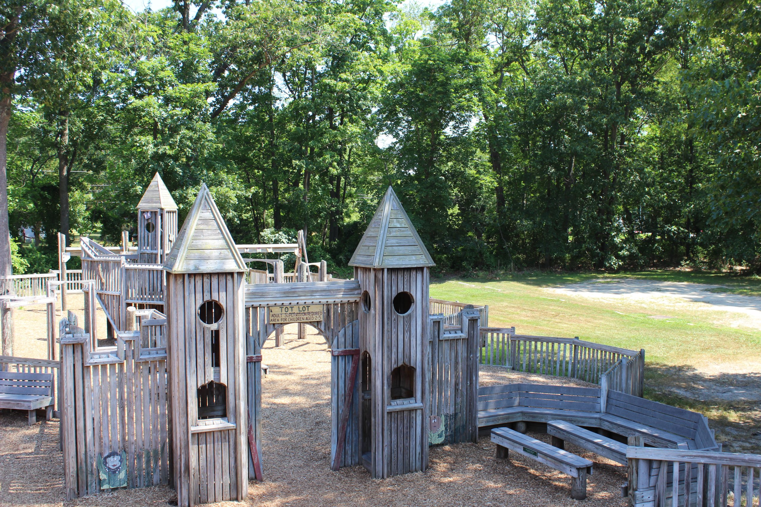 TOT lot WIDE shot of Jackson Jungle Play Park Playground in Jackson NJ