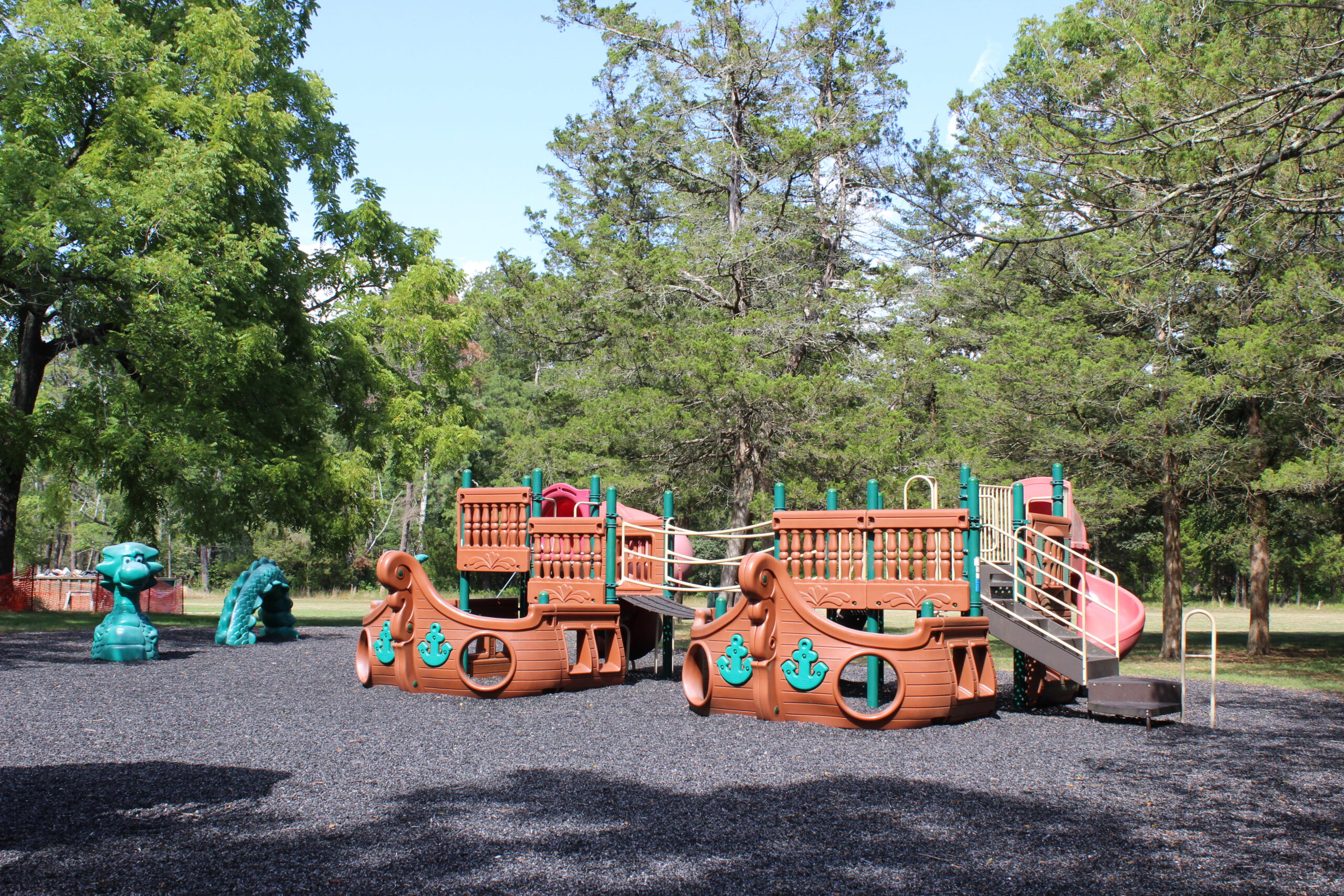 Back Estell Manor Park Playgrounds in Mays Landing NJ - WIDE image - pirate ship playground with sea serpent
