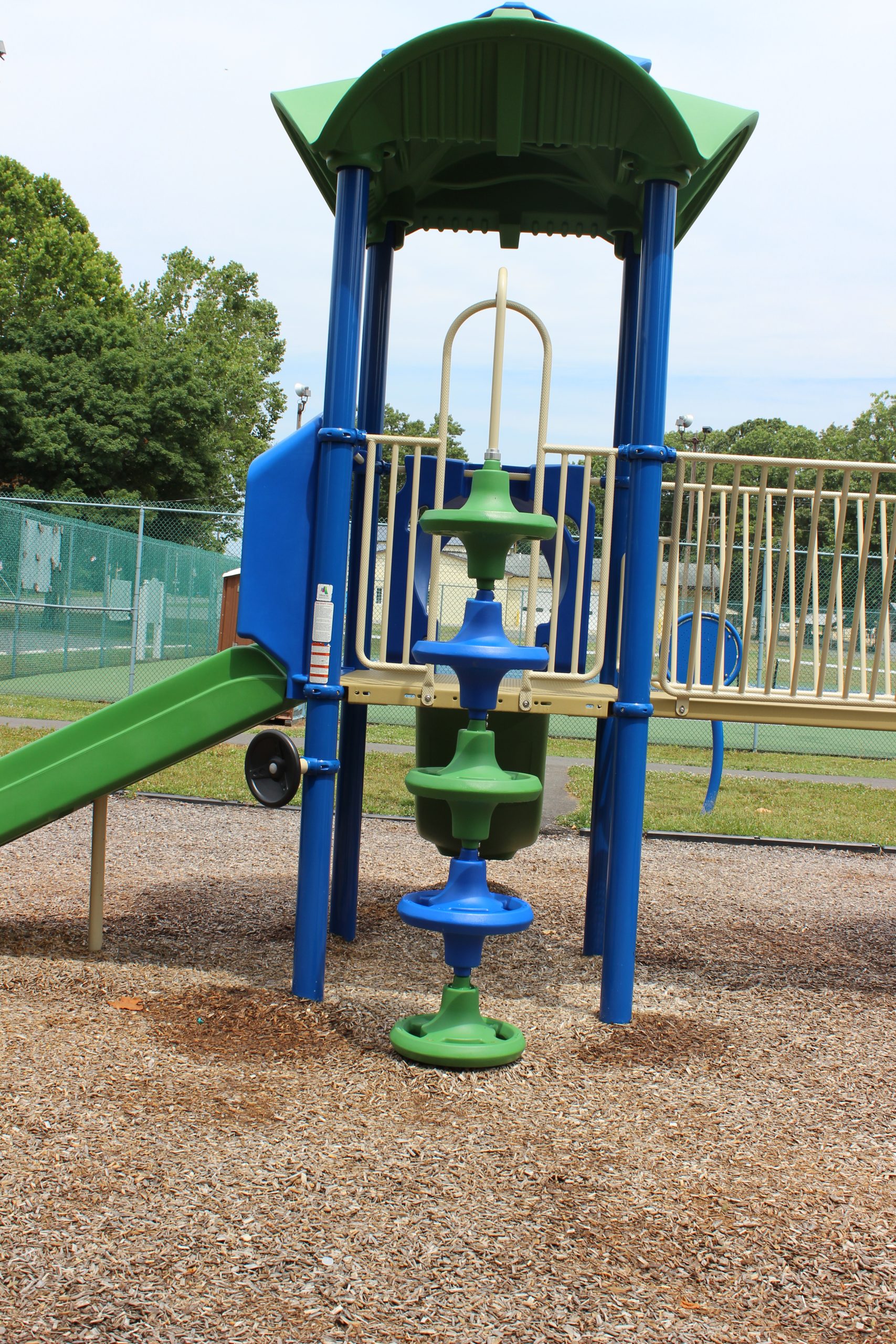 FEATURES - Climbing ladder of discs at Frank LoBiondo Sr. Park Playground in Deerfield Township NJ