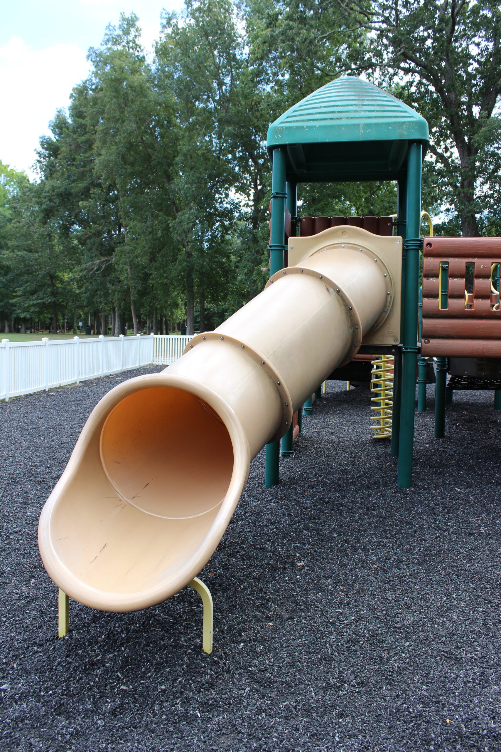 Front Estell Manor Park Playgrounds in Mays Landing NJ - SLIDES - tunnel straight slide on log cabin playground TALL image