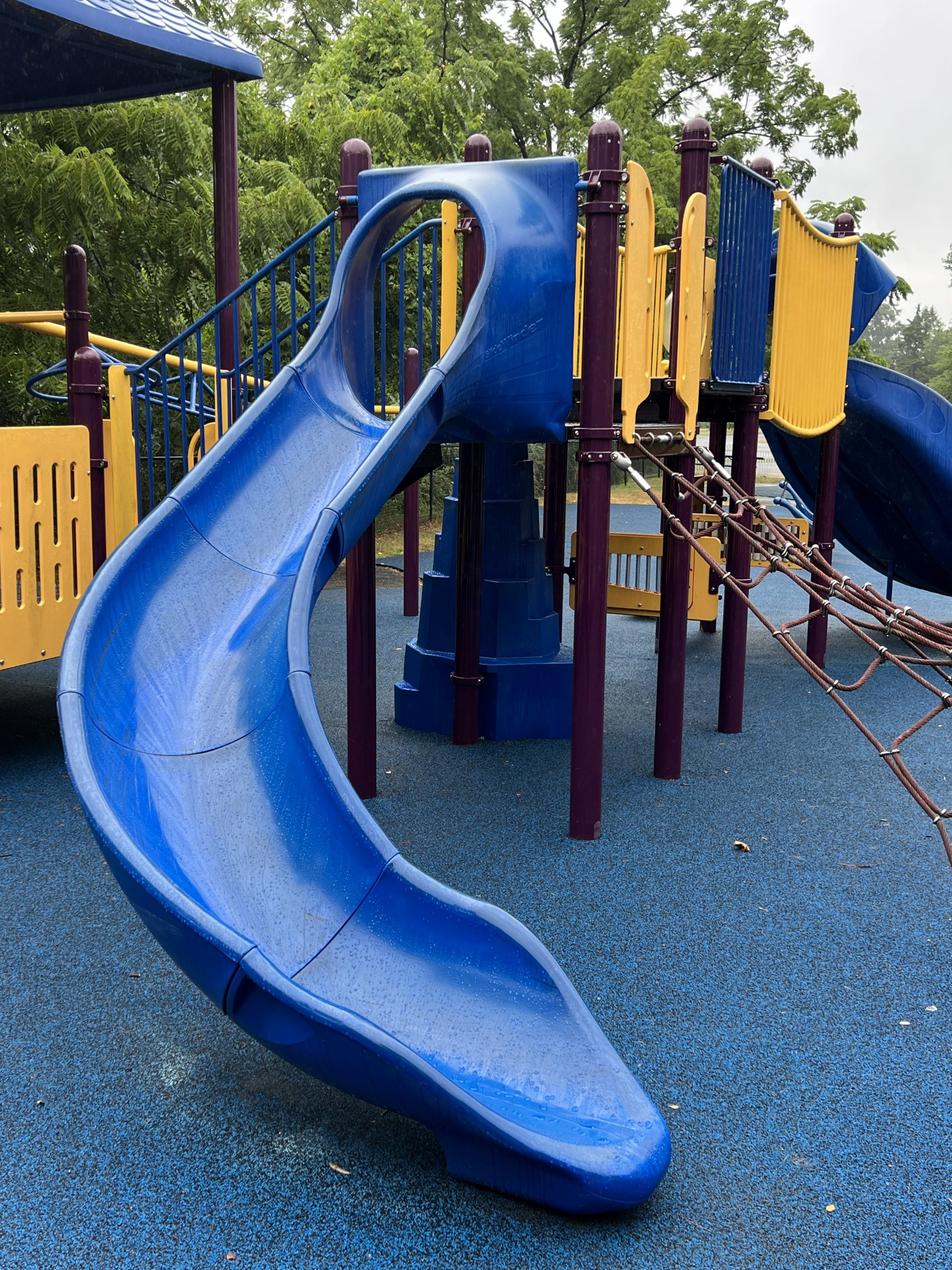 George M. Conway Park Playground in West Long Branch NJ - Larger Playground Feature - SLIDE blue curvy slide